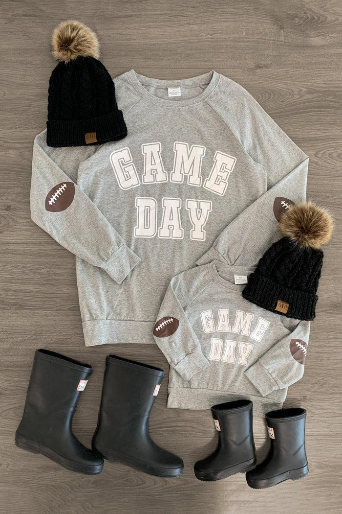 Mom & Me - "Game Day" Gray Long Sleeve Top - CHILD-3XS-6-12 Months - Gray long sleeve "Game Day" top with football elbow patches, paired with black boots and pom-pom beanies for mom and child.