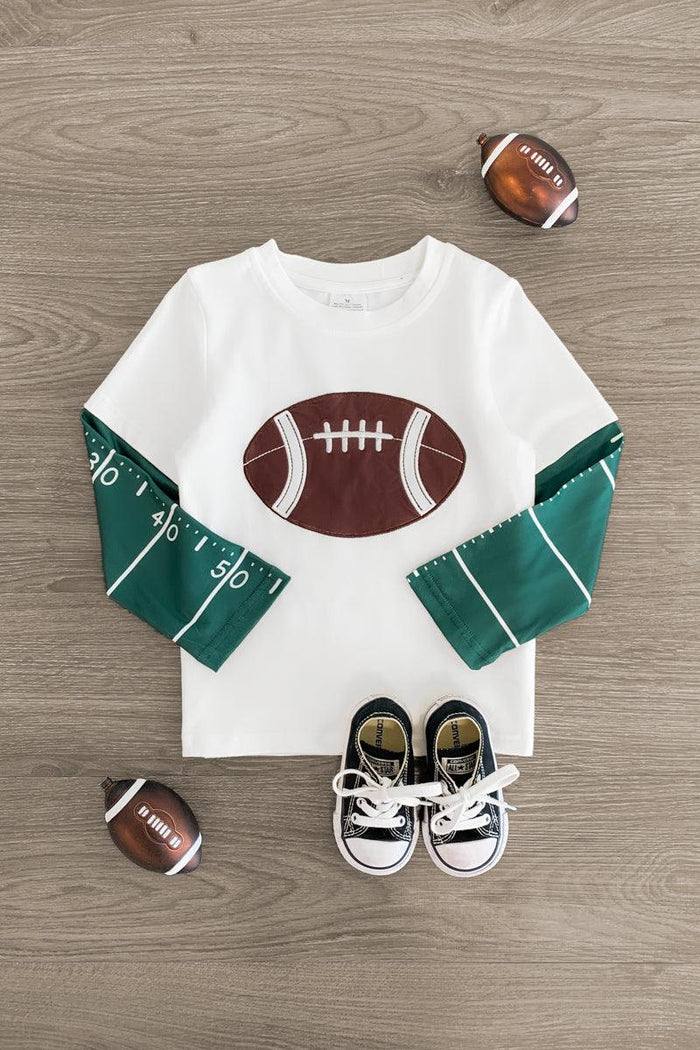 White Football Long Sleeve T-Shirt - 3XS-6-12 Months - White long sleeve toddler shirt with green football field sleeves and brown football graphic on front.