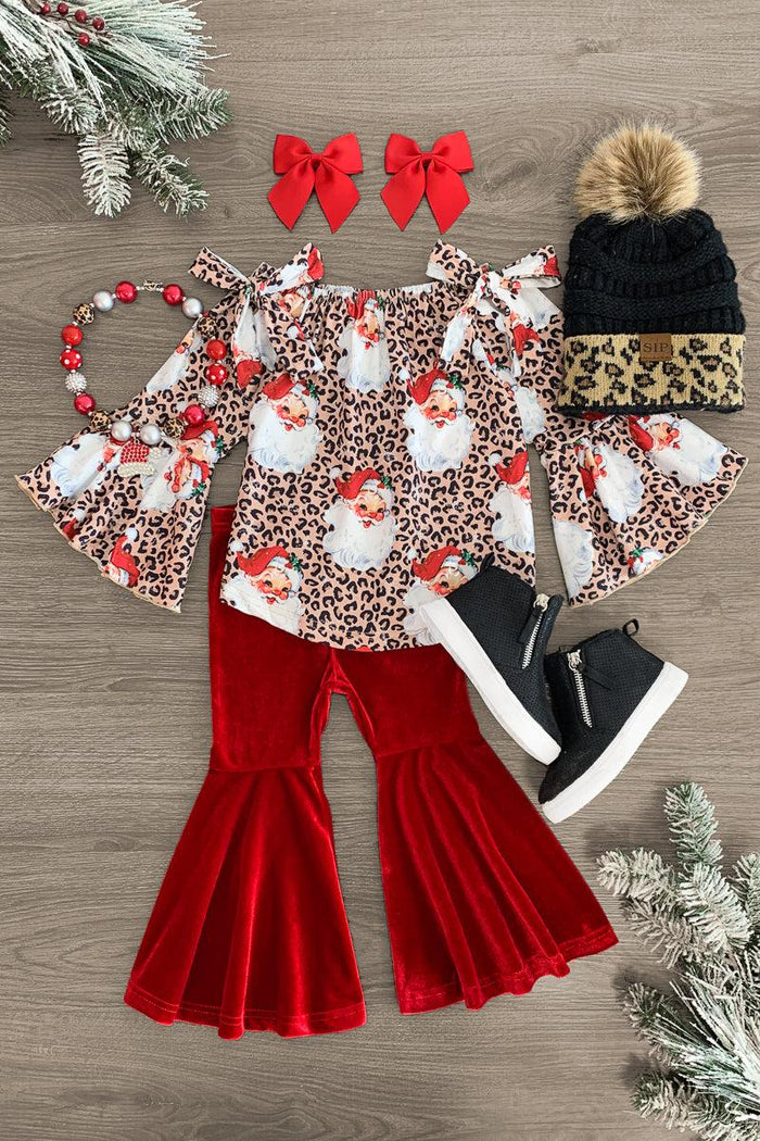 Red Velvet Cheetah Santa Bell Bottom Set - 3XS-6-12 Months - Toddler and girls red velvet bell-bottom pants with leopard print long-sleeve tops, red bows, leopard beanie, and black.