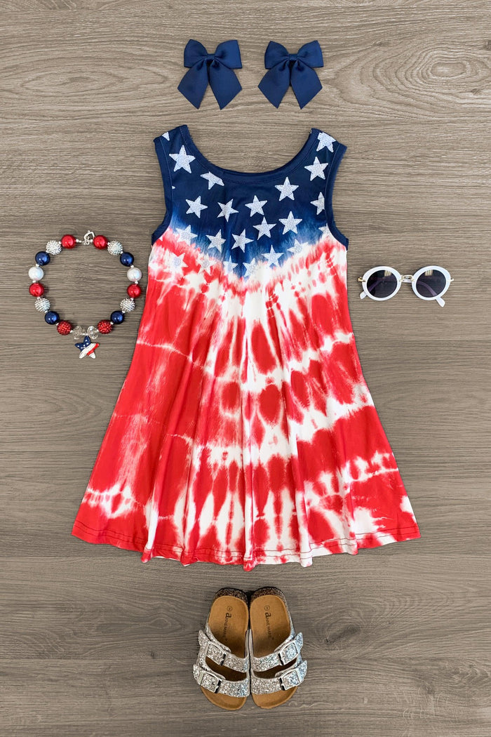 Red White & Blue Tie Dye Tank Dress - 6-12 Months - Red, white, and blue tie-dye sleeveless dress with star pattern, paired with matching blue bows, red-white-blue bead.