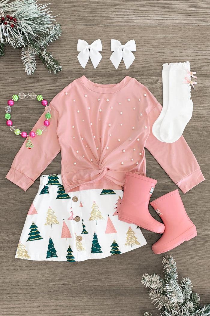 Pink Pearl Christmas Tree Skirt Set - 3XS-6-12 Months - Pink long-sleeve knot-front top with white polka dots, Christmas tree print skirt, white socks with bow, pink boots, white.