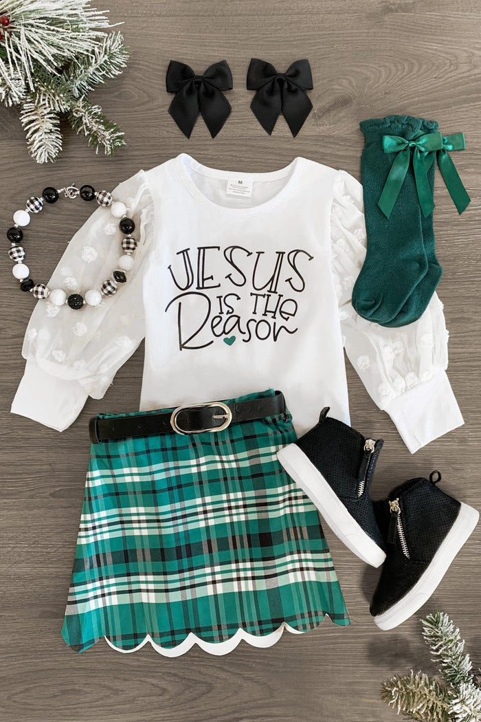 "Jesus Is The Reason" Plaid Skirt Set - 3XS-6-12 Months - White long-sleeve shirt with "Jesus Is The Reason" text, green plaid skirt with scalloped hem, black boots, green knee-high.