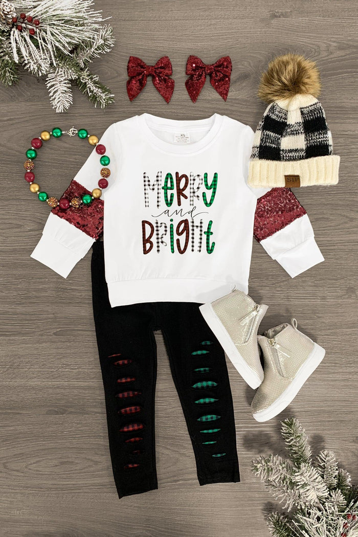 "Merry & Bright" White Sequin Legging Set - 3XS-6-12 Months - White long-sleeve top with "Merry & Bright" text and white sequin sleeve cuffs paired with black leggings featuring red and.