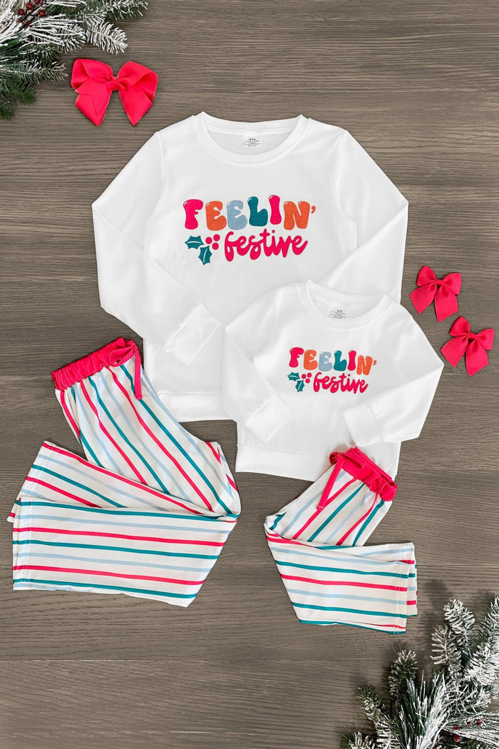 Mom & Me - "Feelin' Festive" White Ribbed Stripe Pajamas - CHILD-3XS-6-12 Months - White ribbed long-sleeve pajamas with red and teal "Feelin' Festive" text and matching striped pants.