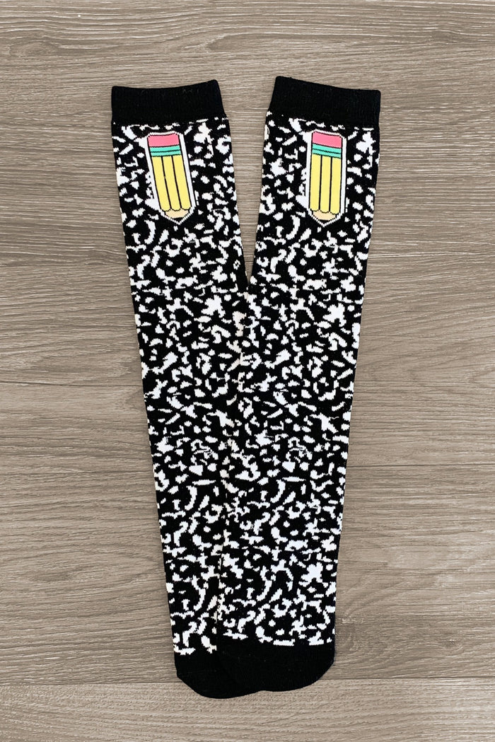 Composition Notebook Knee High Socks - Default Title - Knee-high socks with black and white composition notebook pattern and a colorful pencil design near the top.