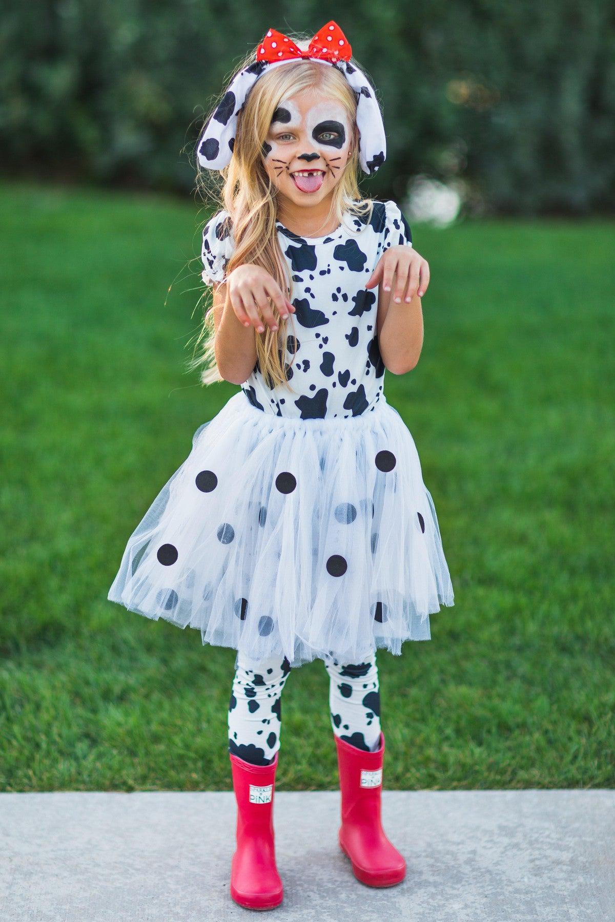 Dalmatian 5 Piece Costume Set - XXS-12-18 Months - Child wearing a Dalmatian costume with black spots, tutu skirt, matching leggings, headband with ears, and red boots.
