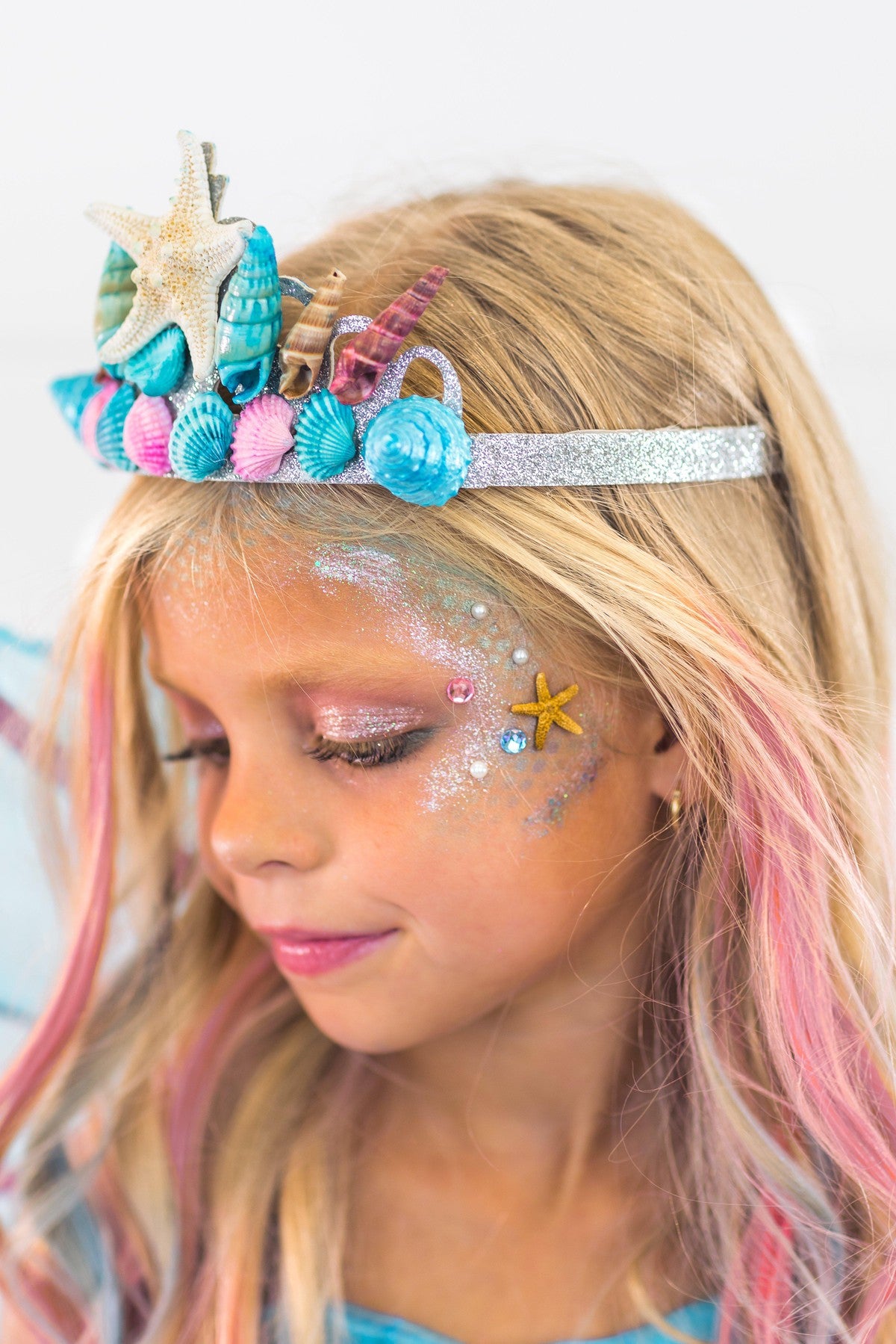 Deluxe Mermaid Costume - 4 Piece Complete Set! - XXS-12-18 Months - Silver headband with blue and pink seashell decorations worn by child with pink-streaked blonde hair.