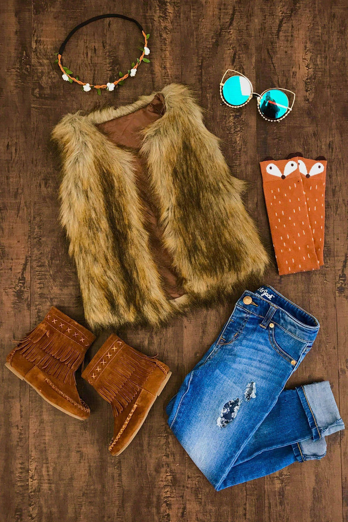 Deluxe Tan Fur Vest - 3XS-6-12 Months - Tan faux fur vest with a sleeveless design styled with brown boots, distressed blue jeans, aviator sunglasses, and a beaded.