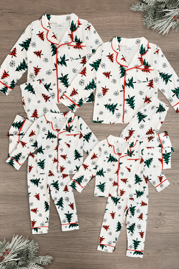https://sparkleinpink.com/cdn/shop/products/festive-winter-trees-family-pajama-set-pajamas-sparkle-in-pink-454547_550x550.png?v=1634783181