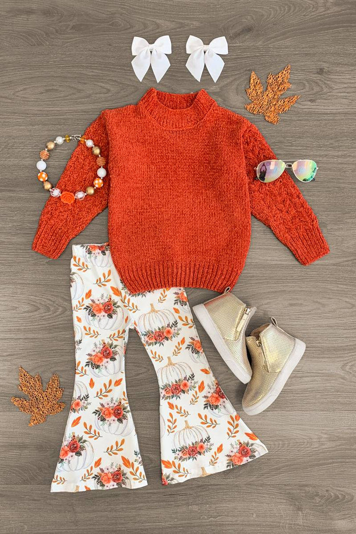 Floral Pumpkin Sweater Bell Bottom Set - 3XS-6-12 Months - Orange fuzzy sweater with high neck paired with white bell-bottom pants featuring orange floral print, styled with white bow .