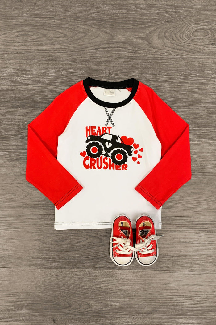 "Heart Crusher" Long Sleeve Top - 3XS-6-12 Months - White long sleeve top with red raglan sleeves and black collar, featuring a red and black monster truck graphic with "Heart.