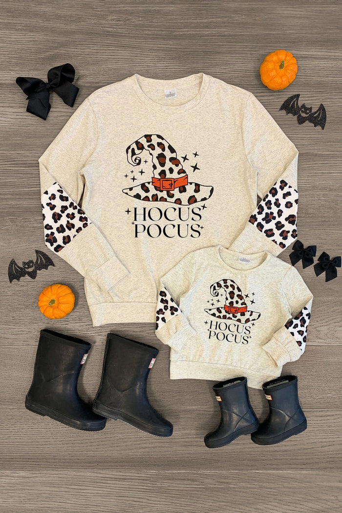 Mom & Me - "Hocus Pocus" Long Sleeve Top - CHILD-2XS-12-18 Months - Cream long sleeve tops with cheetah print witch hat and "Hocus Pocus" text, styled for mom and child.
