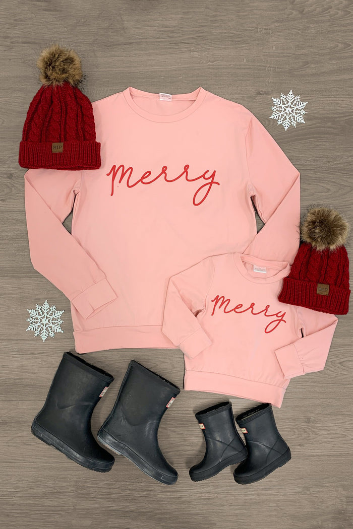 Mom & Me - "Merry" Blush Pink Pullover - CHILD-3XS-6-12 Months - Blush pink pullover with red "merry" script, paired with red knit hats with pom-poms and black rain boots for adult and.