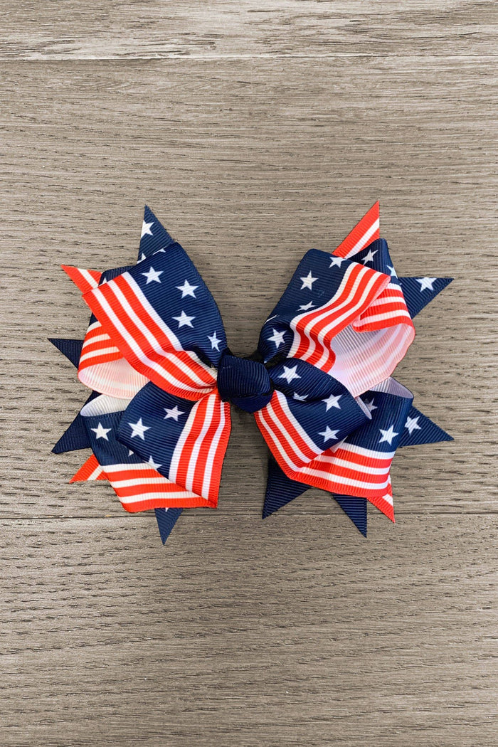 Navy Stars & Stripes Bow - Default Title - Navy bow with layered stars and stripes pattern in red, white, and blue with central navy knot.