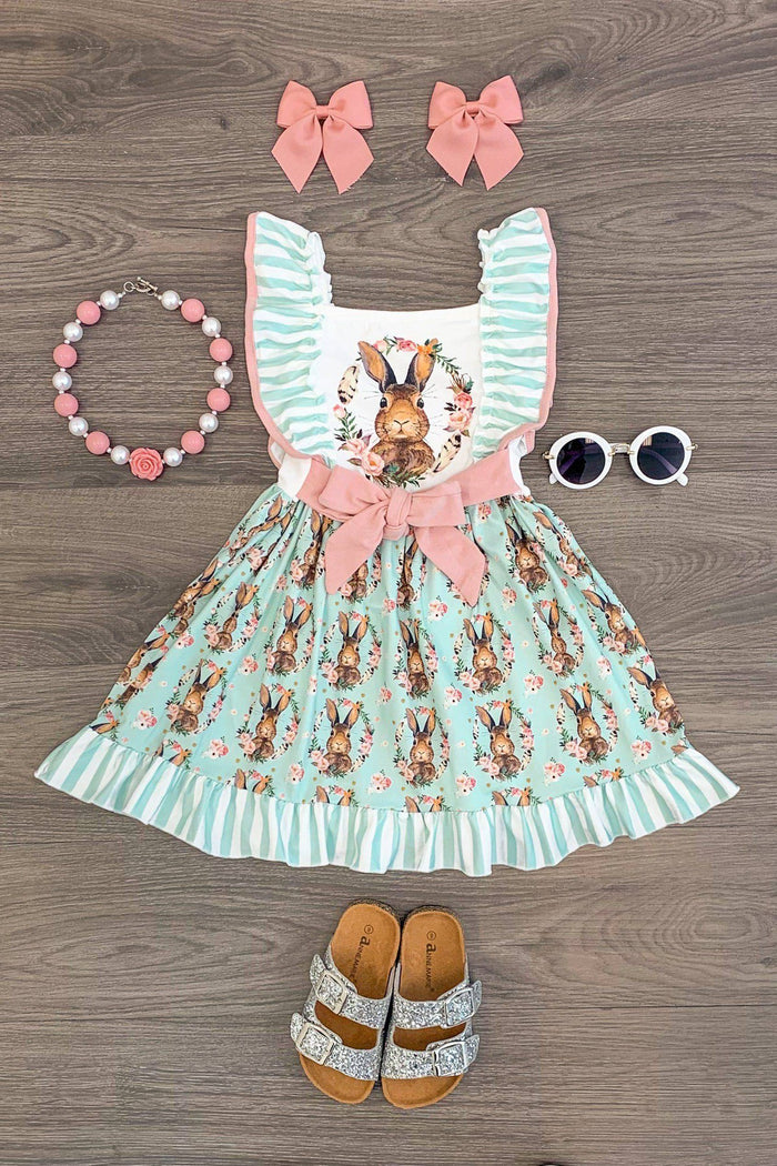 Peter Cottontail Mint Ruffle Dress - 3XS-6-12 Months - Mint green girls' dress with Peter Cottontail print, pink ruffle trim, and matching bow accessories.