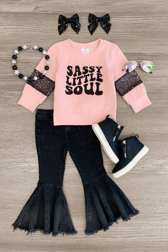"Sassy Little Soul" Denim Bell Bottom Set - 3XS-6-12 Months - Pink long-sleeve top with "Sassy Little Soul" text and black bell-bottom denim pants with ruffled hems, paired with black.