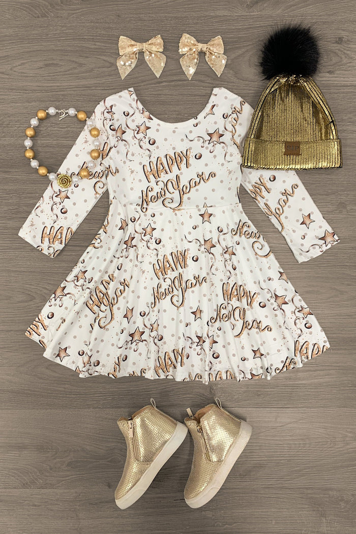 "Happy New Years" White & Gold Dress - 3XS-6-12 Months - White long-sleeve dress with gold "Happy New Years" script and confetti, paired with gold bows, beaded bracelet, gold boots, .