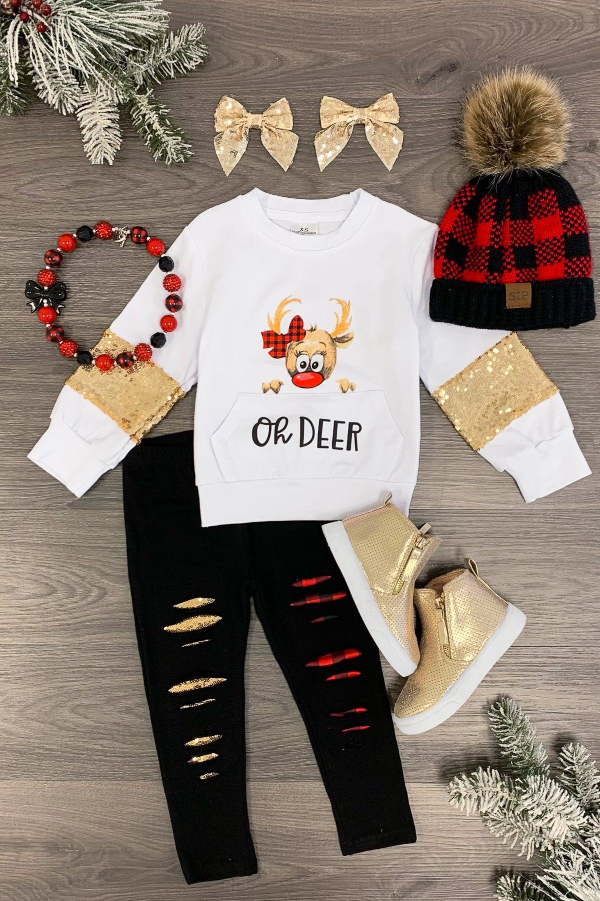 White "Oh Deer" Legging Set - 3XS-6-12 Months - White long-sleeve shirt with reindeer and "Oh Deer" text, black distressed leggings, gold booties, buffalo plaid hat with.